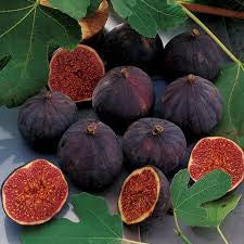 Whole purple figs and cut halves showing red interiors.